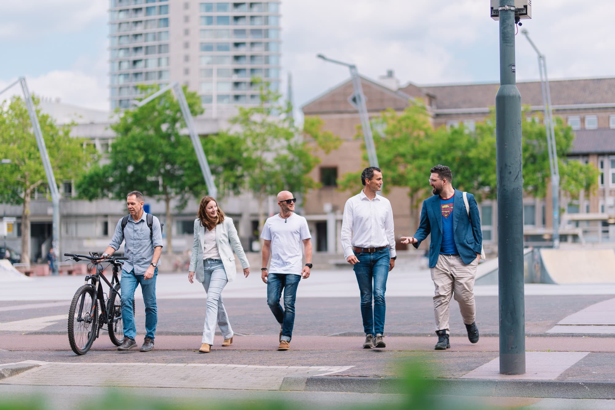 The R² team walking through a Dutch city square